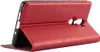 A red flip case for a smartphone is shown from the side, propped open. Náhled obrázku produktu