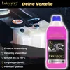 A bottle of pink coolant next to a car's coolant reservoir. Produktbild-Vorschau