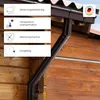 A close-up view of a brown gutter system attached to a wooden building, with informational text boxes on the left. Produktbild-Vorschau