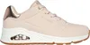 A side view of a beige Skechers sneaker with rose gold accents. Anteprima dell’immagine prodotto