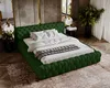 A luxurious bedroom setting featuring a green tufted bed. Náhľad obrázku produktu