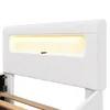 A close-up view of a white upholstered headboard with integrated LED lighting. Produktbild-Vorschau