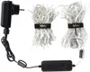 A black power adapter and a string of white LED lights are displayed against a white background. Náhled obrázku produktu