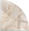 A quarter circle of a glass hearth plate with a marble pattern. Produktbild-Vorschau