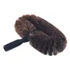 A brown and black brush with a black handle, isolated on a white background. Produktbild-Vorschau