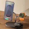 A black 3-in-1 wireless charging stand with a Samsung phone, smartwatch, and earbuds case. Podgląd zdjęcia produktu