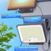 A solar lamp with its solar panel and a power cable, with descriptive text overlays. Produktbild-Vorschau