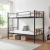 A black metal bunk bed with white mattresses and pillows is shown in a room with a window and a plant. Anteprima dell’immagine prodotto