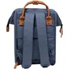 The back view of a blue backpack with brown leather accents. Voir les images du produit