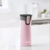 A pink Contigo travel mug is shown on a white countertop. Podgląd zdjęcia produktu