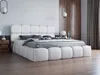 A modern bedroom with a white upholstered bed. Náhled obrázku produktu