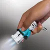 A hand holding a LEGO Star Wars Stormtrooper keychain flashlight, with the light beam shining. Produktbild-Vorschau