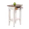 A small wooden side table with a drawer and a shelf, a green apple on top. Náhled obrázku produktu