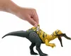 A hand is holding a small tag with a QR code over the back of a toy dinosaur. Náhľad obrázku produktu