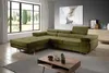 A modern living room with a large green sectional sofa, a coffee table, and a large window with a view of trees. Produktbild-Vorschau