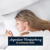 A woman sleeping peacefully on a white pillow and bedding. Produktbild-Vorschau