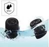 Two black Bluetooth speakers submerged in water, with water splashing around them. A graphic indicating IPX7 water resistance is in the top left corner. Náhled obrázku produktu