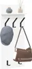 A white wall-mounted shelf with hooks, holding a hat and a bag. Decorative items are on the shelf. Náhled obrázku produktu