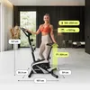 A woman is posing next to a stationary exercise bike in a modern room. The image includes measurement annotations. Produktbild-Vorschau