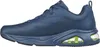 A side view of a navy blue Skechers sneaker with a lime green air bubble in the sole. Produktbild-Vorschau