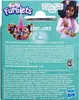 The back of a Furby Furblets toy packaging, showing the toy, a character illustration, and product information in multiple languages. Produktbild-Vorschau
