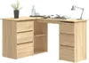 A light brown wooden corner desk with drawers and shelves, viewed from a slightly elevated angle. A desk lamp, books, and a potted plant are on the desk. Produktbild-Vorschau