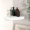 A white corner shelf with decorative bottles and a plant. Produktbild-Vorschau