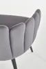A close-up view of a grey velvet chair with a petal-like backrest and black legs, set against a white background. Produktbild-Vorschau