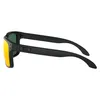 A side view of a pair of black Oakley sunglasses with yellow lenses. Náhled obrázku produktu