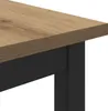 Close-up of the corner of a table with a wooden top and black legs. Produktbild-Vorschau