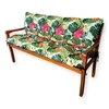 A wooden garden bench with floral patterned cushions. Produktbild-Vorschau