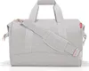 A studio shot of a gray duffel bag with rose gold accents. Produktbild-Vorschau