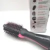 A close-up of a Revlon hair dryer brush next to its packaging, which displays product features. Podgląd zdjęcia produktu