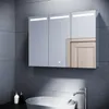 A modern bathroom with a medicine cabinet, sink, and faucet. Náhled obrázku produktu