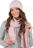 A woman wearing a pink hat and scarf over a grey sweater, posing against a white background. Produktbild-Vorschau