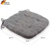 A square seat cushion with ties, shown from a slightly elevated angle against a white background. Dimensions are indicated by lines and text. Podgląd zdjęcia produktu