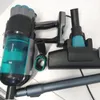 A collection of vacuum cleaner parts laid out on a tiled surface. Produktbild-Vorschau