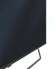 A close-up, angled view of the bottom right corner of a television set, showing its stand. Produktbild-Vorschau
