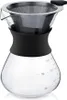 A glass pour-over coffee maker with a stainless steel filter and a black silicone grip. Produktbild-Vorschau
