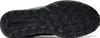 The underside of a black outdoor shoe sole. Produktbild-Vorschau