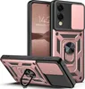 A rose gold and black armor phone case with a ring holder is displayed with a phone inside. Produktbild-Vorschau