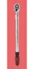 A studio shot of a long ratchet wrench against a solid red background. Náhled obrázku produktu