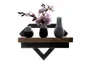 Three vases with flowers on a shelf. Produktbild-Vorschau