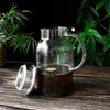 Glaskaraffe 1,5L mit Edelstahl Filter und Relief Wasserkrug Produktbild-Vorschau 3