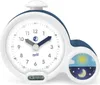 A white and blue alarm clock with a digital display and a day/night indicator. Produktbild-Vorschau