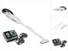 A white cordless vacuum cleaner with two batteries and a charger, displayed on a white background. Náhled obrázku produktu
