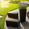 A garden setting with black planters and benches, featuring lavender flowers. Anteprima dell’immagine prodotto