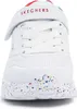 Close-up front view of a white sneaker with colorful speckles on the sole. Produktbild-Vorschau