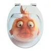A toilet seat with a printed image of a cartoon goldfish in a fishbowl. Produktbild-Vorschau