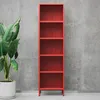 A red metal bookshelf is shown in front of a grey concrete wall, with a potted plant on the left side of the image. Náhľad obrázku produktu